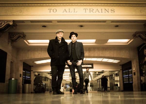 Billy Bragg (left) and Joe Henry on their railroad tour from Chicago to Los Angeles