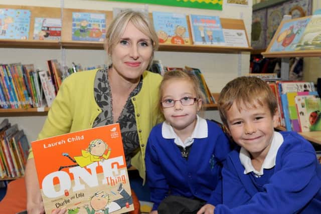 Author Lauren Child with Lola Measor and Charlie Richardson and her new book One Thing
Picture: Sarah Standing (161559-6568)