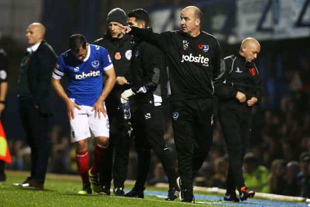 Pompey fans have questioned Paul Cook's tactics Picture: Joe Pepler