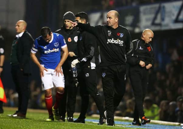 Pompey fans have questioned Paul Cook's tactics Picture: Joe Pepler