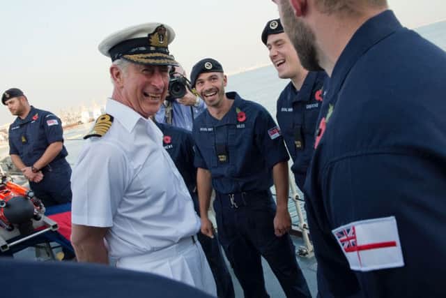 HRH The Prince of Wales shares a joke with the ships company of HMS Middleton. Picture: PO G Granger US Navy