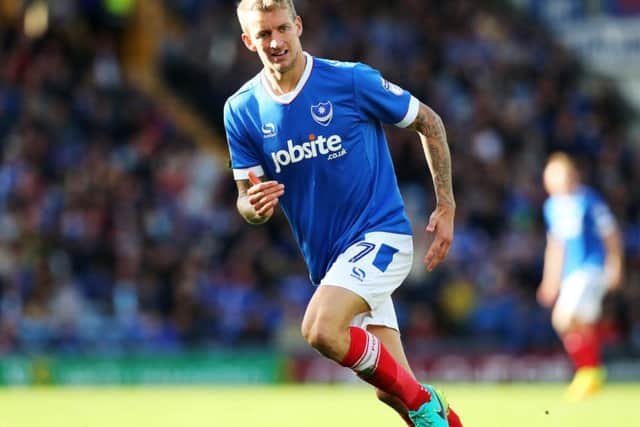Pompey midfielder Carl Baker Picture: Joe Pepler