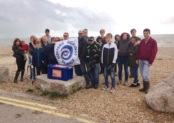 Cliff Culver leading a Surfers Against Sewage beach clean at Stokes Bay
