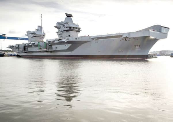 Dredging works are being carried out ahead of HMS Queen Elizabeth