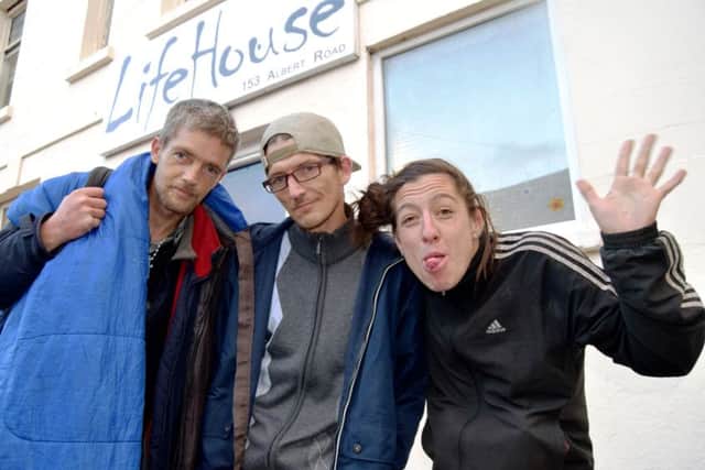 Simon, Neil and Stephanie, who all visit the LifeHouse in Portsmouth Picture: Tom Cotterill