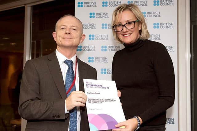Gosport MP Caroline Dinenage presents Bay House School's international co-ordinator Simon Hall with the British Council International School Award.
Credit: J.GM Photography