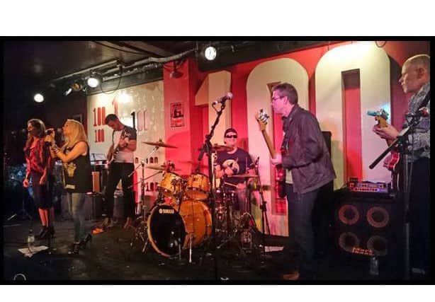 The Hughe Fighters at the 100 Club in London. From left, guest backing vocalist Helen Jarvis, lead singer Mary Pearson, Joe Walker on lead guitar, Russell Mogridge on drums, Tim Clark on bass guitar and Carl Walker on rhythm guitar
