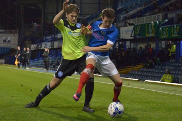 Kyle McDowell in action in tonight's game between Pompey Academy and Metropolitan Police Picture: Colin Farmery