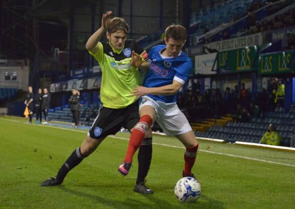 Kyle McDowell in action in tonight's game between Pompey Academy and Metropolitan Police Picture: Colin Farmery