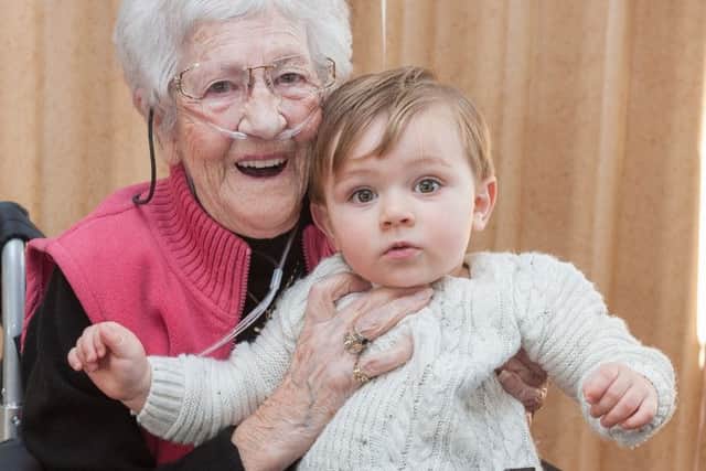 Elizabeth Smith celebrated her 100th birthday at the Alexandra Bowls Club. Here she is with her great-great grandson Albert Perkins, 15 months. Picture: Keith Woodland.