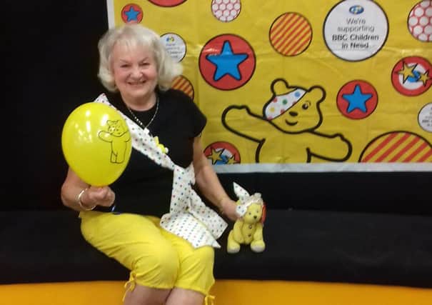 cin 2016 Southsea Library
Children in Need
caption: June Haselmere at Southsea Library raising money for Children in Need.
Picture: George Scotland
georgescotland1994