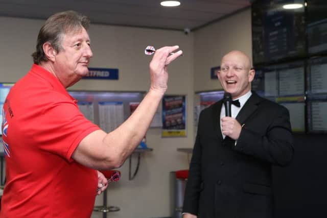 Eric Bristow with MC Paul Booth