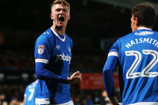 Michael Smith celebrates scoring his equaliser against Cheltenham Picture: Joe Pepler