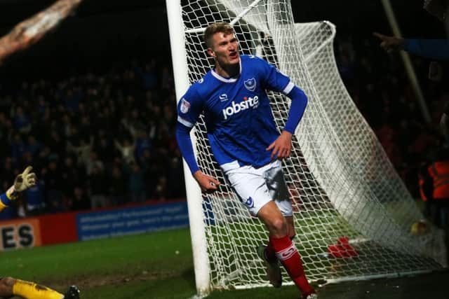 Michael Smith celebrates his equaliser Picture: Joe Pepler