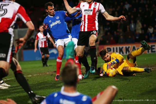 Cheltenham goalkeeper Russell Griffiths' fumble from Carl Baker's cross presented Michjael Smith with his equaliser against Cheltenham Picture: Joe Pepler