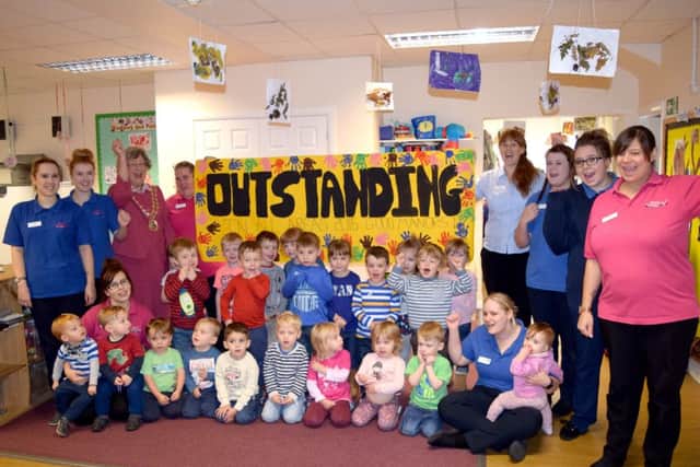 Staff and pupils of Good Manners Day Nursery in Miller Drive, Fareham along with Fareham's Mayor Councillor Connie Hockley celebrating their 'Outstanding' Ofsted report Picture: Loughlan Campbell
