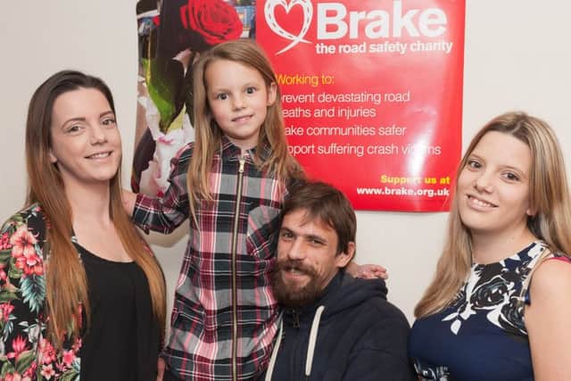 Family of Julie, who was killed. Jodie Eliot, Maisie Penny, 6, Nikolaos Chetham, Jade Eliott. Picture: Keith Woodland.
