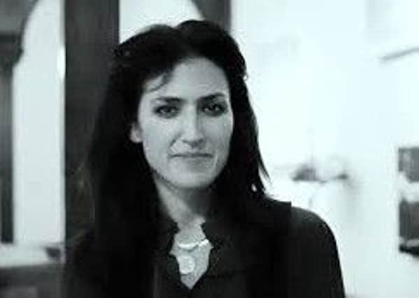 Joan Wasser, known by her stage name Joan As Police Woman PPP-161120-224038001