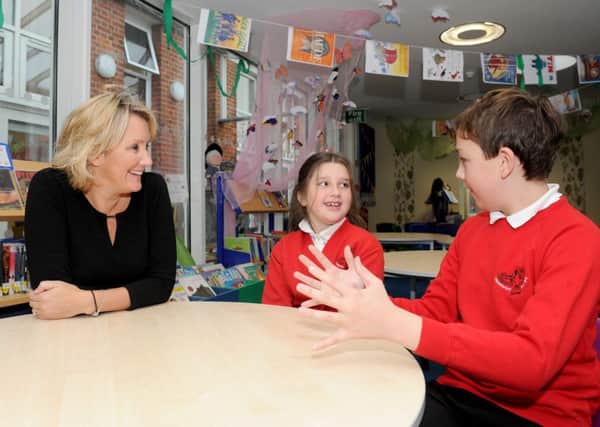 Caroline Dinenage MP talks to Layla Smith (7) and Callum Foster (11).   Picture: Sarah Standing