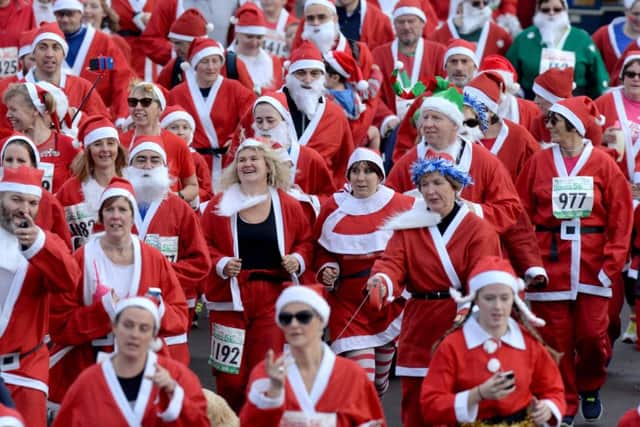Thousands of people take part in Southseas Santa Fun Run, dressed as the great man himself in 2015