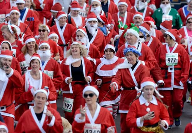 Thousands of people take part in Southseas Santa Fun Run, dressed as the great man himself in 2015