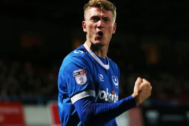 Michael Smith celebrates hos goal against Cheltenham Picture: Joe Pepler