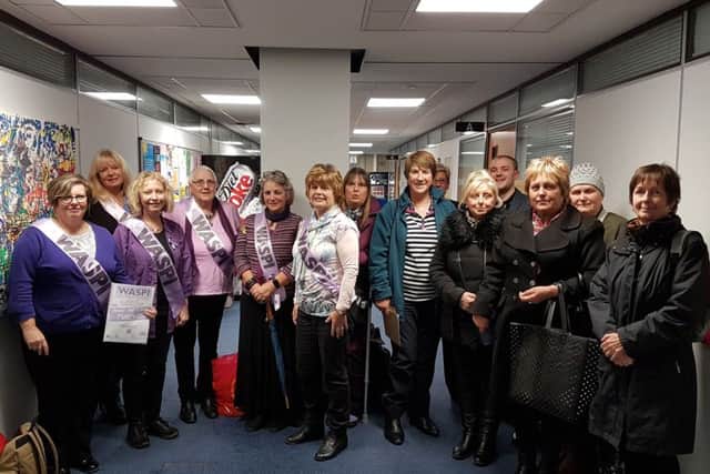 Women Against State Pension Inequality campaigners 

- from left, Elaine Davenport, Christine Neal, Shelagh Simmons, Sally Robinson, Liz Jackson, Carolyne Jacobs, Steph Lafferty, Lynne Stagg, Jeanette Smith, Elaine Hussey, Matthew Winnington, Lorraine Philpott, Hilary Reed and Kathryn Rimmington