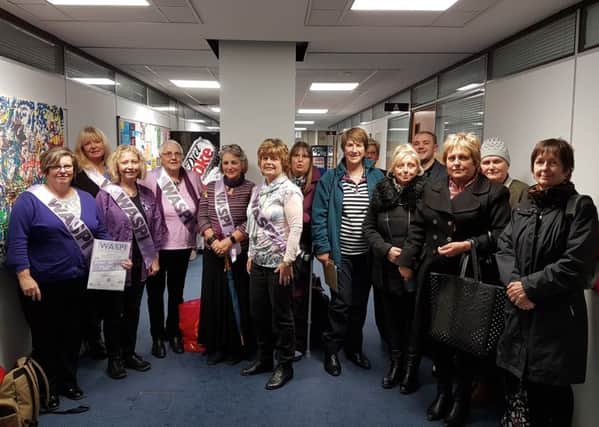 Women Against State Pension Inequality campaigners 

- from left, Elaine Davenport, Christine Neal, Shelagh Simmons, Sally Robinson, Liz Jackson, Carolyne Jacobs, Steph Lafferty, Lynne Stagg, Jeanette Smith, Elaine Hussey, Matthew Winnington, Lorraine Philpott, Hilary Reed and Kathryn Rimmington