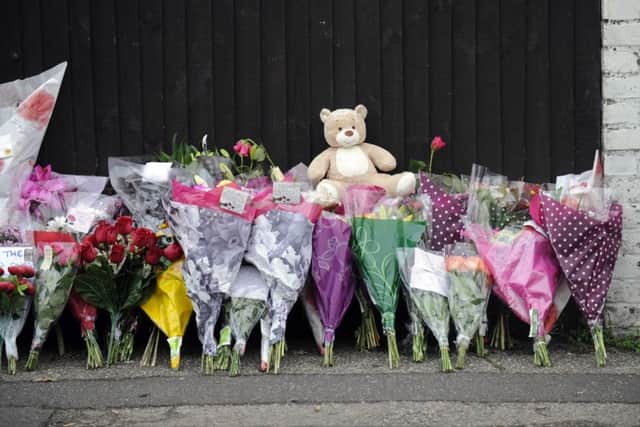 Flowers placed by mourners after the deaths of Jasmine Allsop and Olivia Lewry in Gosport in 2013