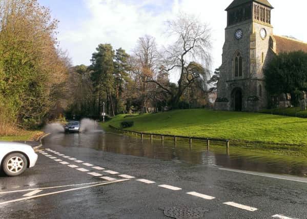 Surface water at the junction of Bridge Street and the A32 in Wickham