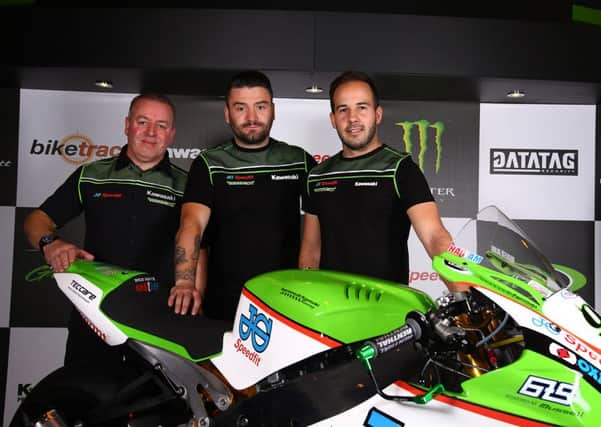 Bournemouth Kawasaki Racing team owner Pete Extance, left, Ricky Stevens, centre, and Ryan Charlwood, right