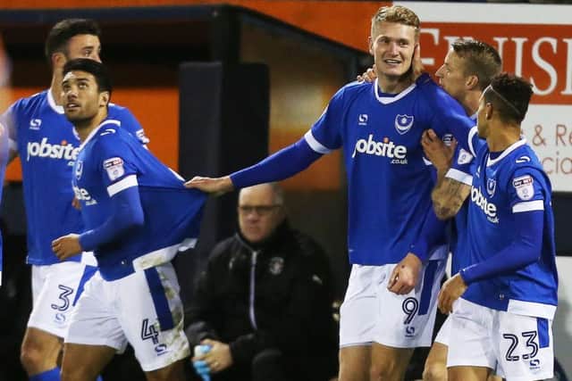 Michael Smith is congratulated after scoring against Luton. Picture: Joe Pepler