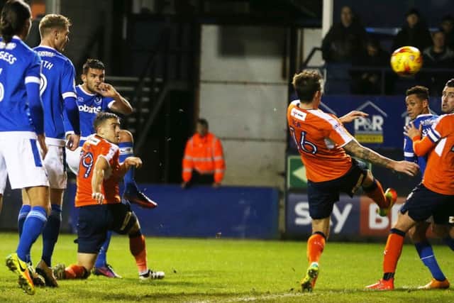 Gareth Evans fires Pompey ahead. Picture: Joe Pepler