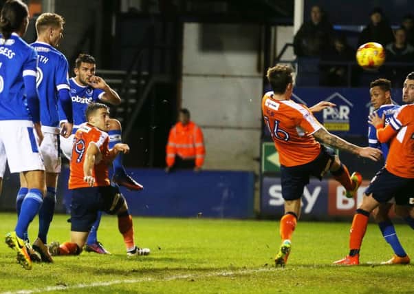 Gareth Evans fires Pompey ahead. Picture: Joe Pepler