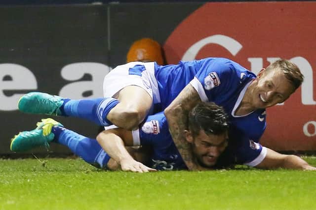 Gareth Evans celebrates his goal with Carl Baker. Picture: Joe Pepler