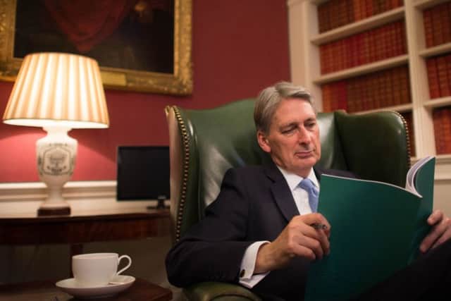 Chancellor of the Exchequer Philip Hammond reads through his Autumn Statement in his office in 11 Downing Street PPP-161123-095000001