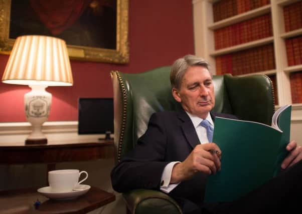 Chancellor of the Exchequer Philip Hammond reads through his Autumn Statement in his office in 11 Downing Street PPP-161123-095000001