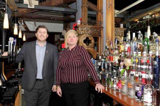 Landlord Daniel O'Brien with business partner Georgia Hutton at The Grapes in London Road, North End, Portsmouth.
Picture: Sarah Standing (161573-3226)