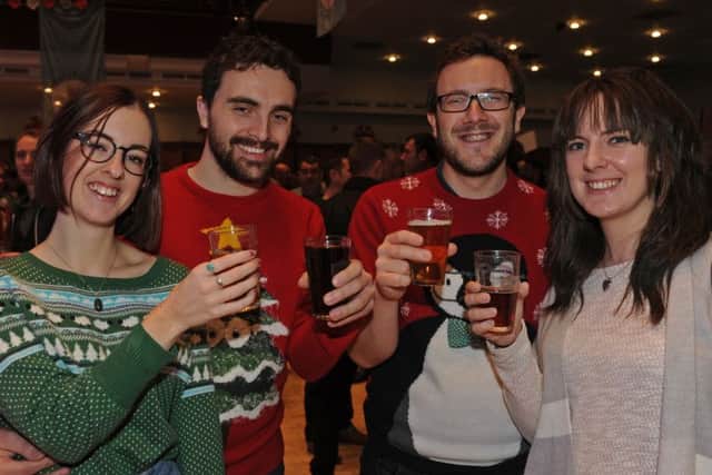 Emily Hardy, Ian Cox and Chris and Jen Stoneham at last year's Christmas Portsmouth Beer Festival Picture: Ian Hargreaves (151960-1)