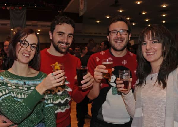 Emily Hardy, Ian Cox and Chris and Jen Stoneham at last year's Christmas Portsmouth Beer Festival Picture: Ian Hargreaves (151960-1)