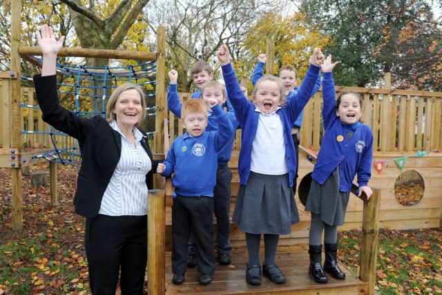 Riverside Community Special School headteacher Catherine Marsh celebrates with some of the children
Picture: Sarah Standing (161591-3401)