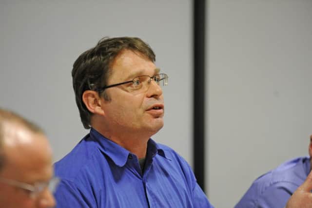 Anti-cuts campaigner Jon Woods believes the council's proposed budget is 'an attack on the poor'