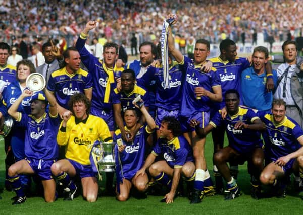 Dave Beasant and Vinnie Jones celebrates Wimbledon's FA Cup success in 1988, just a couple of years after they were collecting Persil coupons to get to games