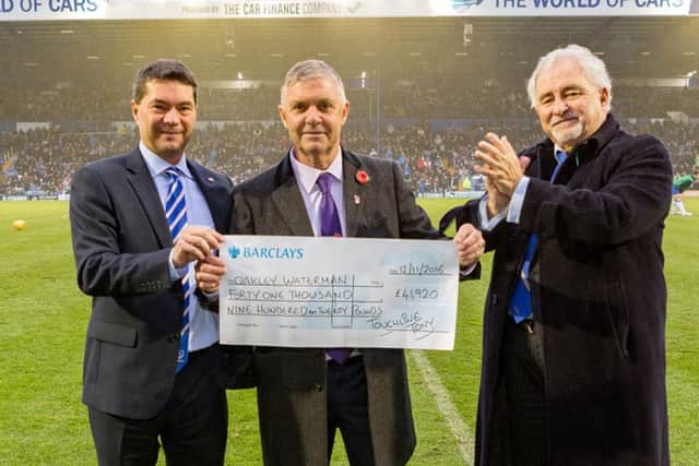 From left, Pompey chief executive Mark Catlin, Tony Male and chairman Iain McInnes