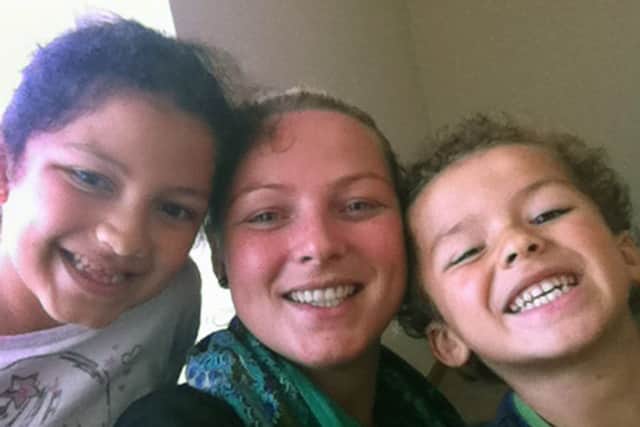 Lacey Plato with her childrenAishah and Faris Al Barwani