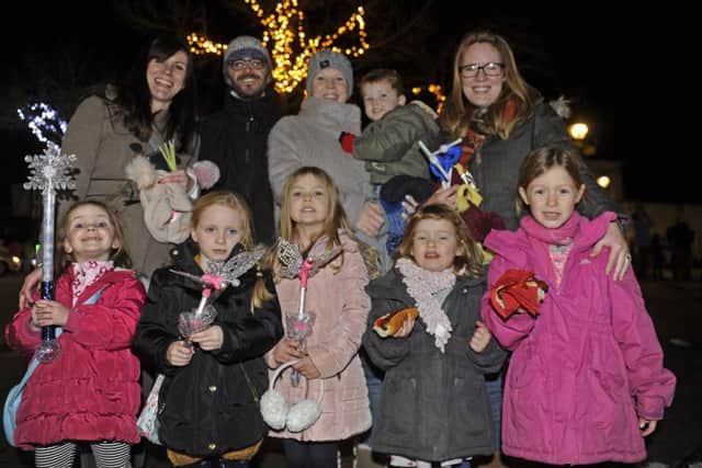 The Fishwick, Strattons and Edgington families enjoy the lights.
Picture: Ian Hargreaves (161342-5)