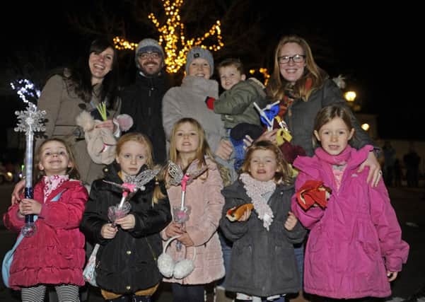 The Fishwick, Strattons and Edgington families enjoy the lights.
Picture: Ian Hargreaves (161342-5)