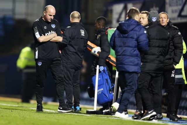 A downbeat Paul Cook after watching Pompey lose 2-1 at home to Stevenage Picture: Joe Pepler