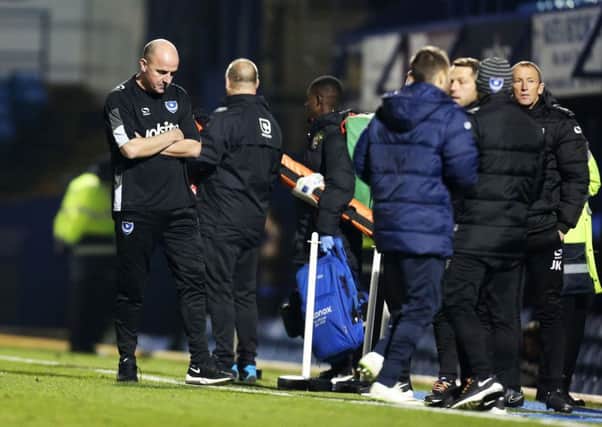 A downbeat Paul Cook after watching Pompey lose 2-1 at home to Stevenage Picture: Joe Pepler