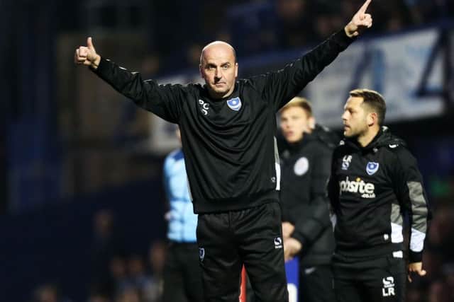 Pompey boss Paul Cook took off Michael Doyle and Christian Burgess at half-time Picture: Joe Pepler